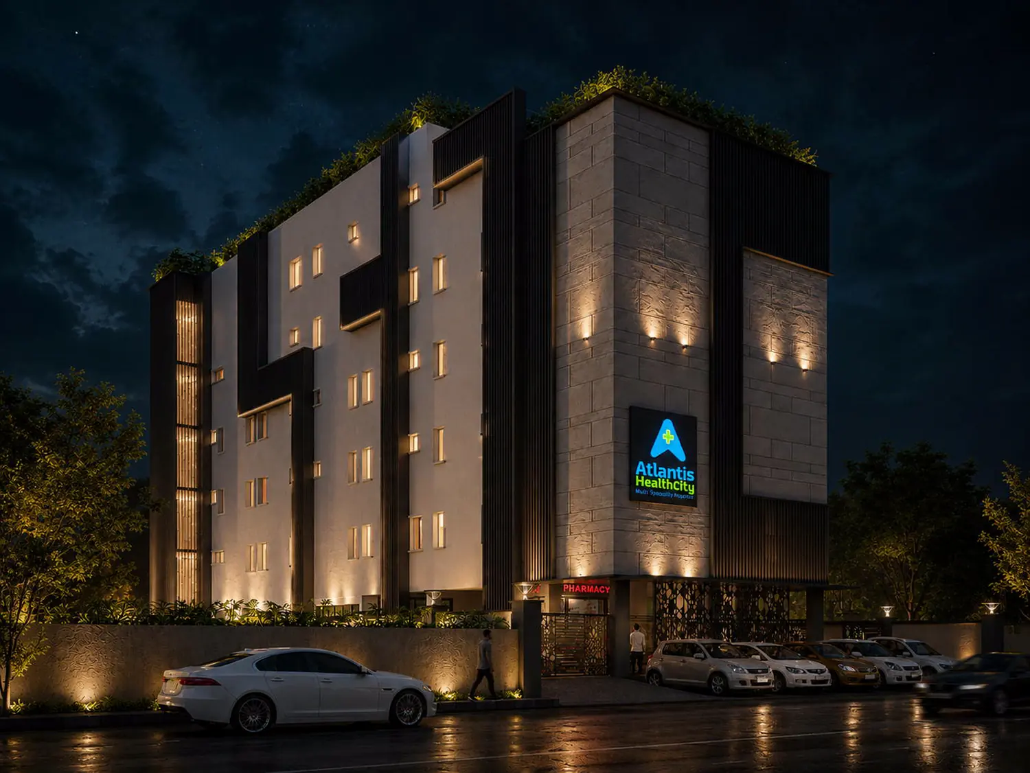 Atlantis Healthcity, Chennai, seen from the approach road at night.