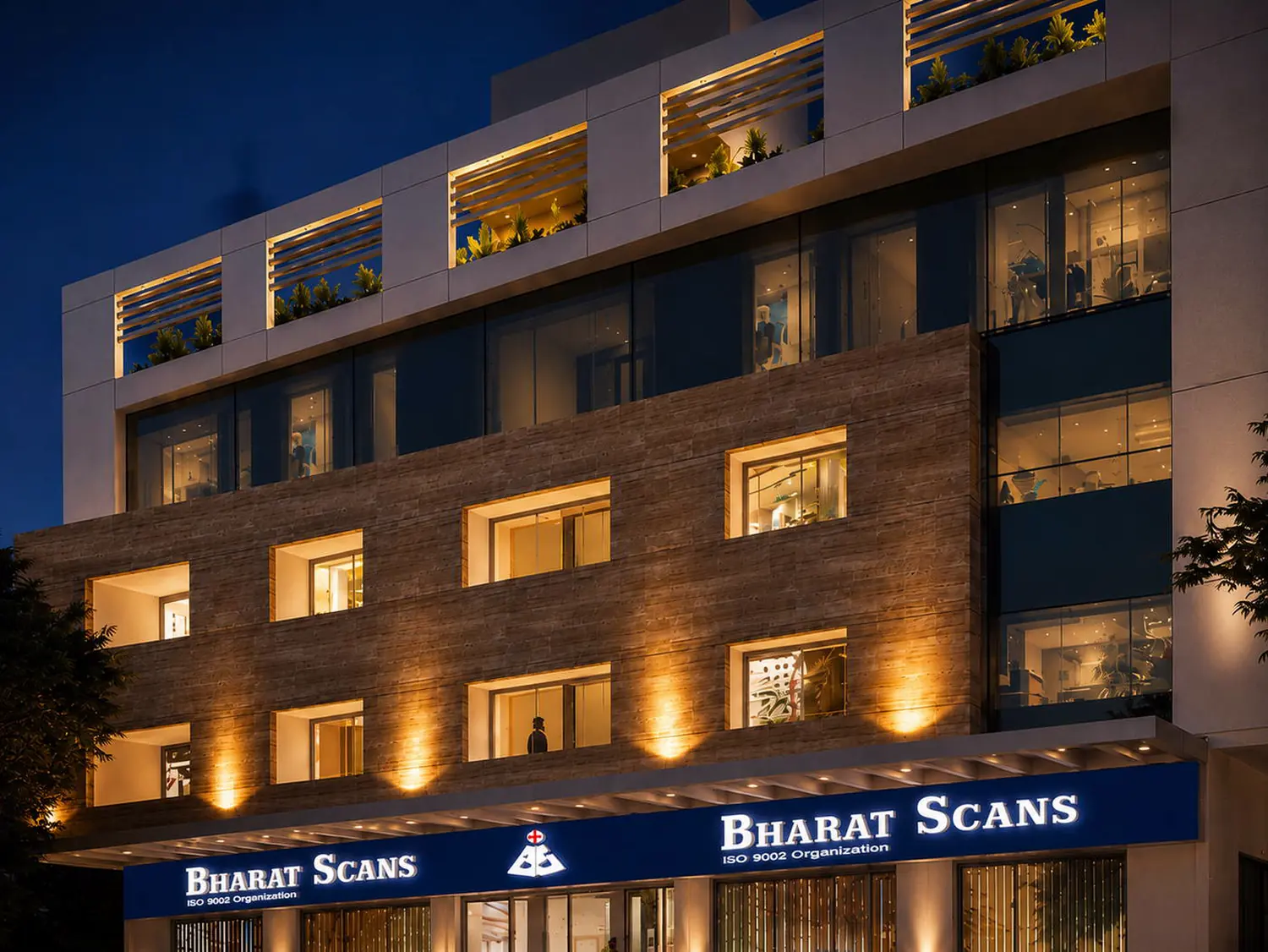 Bharat Scans diagnostic centre, Pondicherry, lit at night.